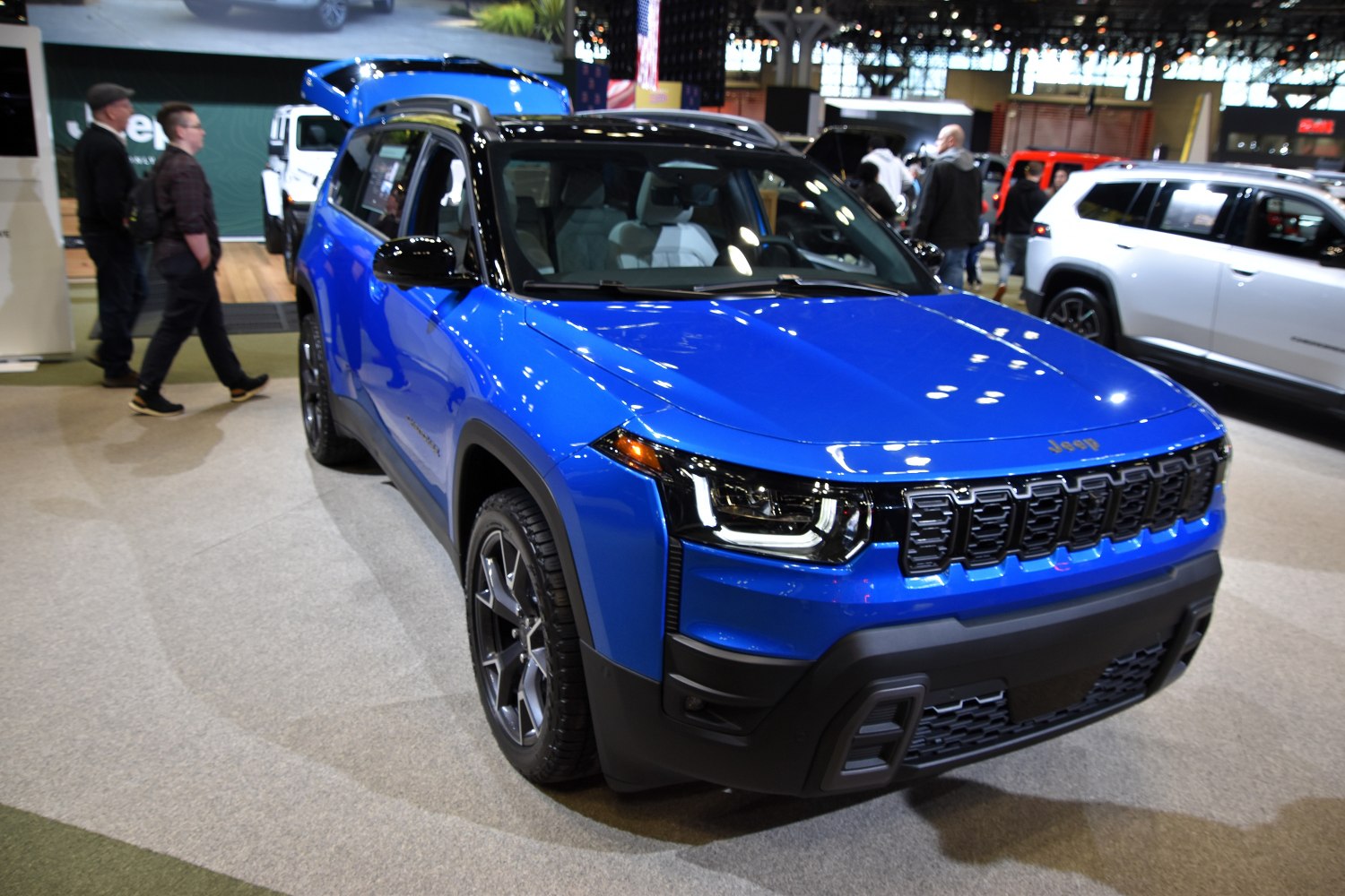 Blue SUV with LED headlights and black roof rails