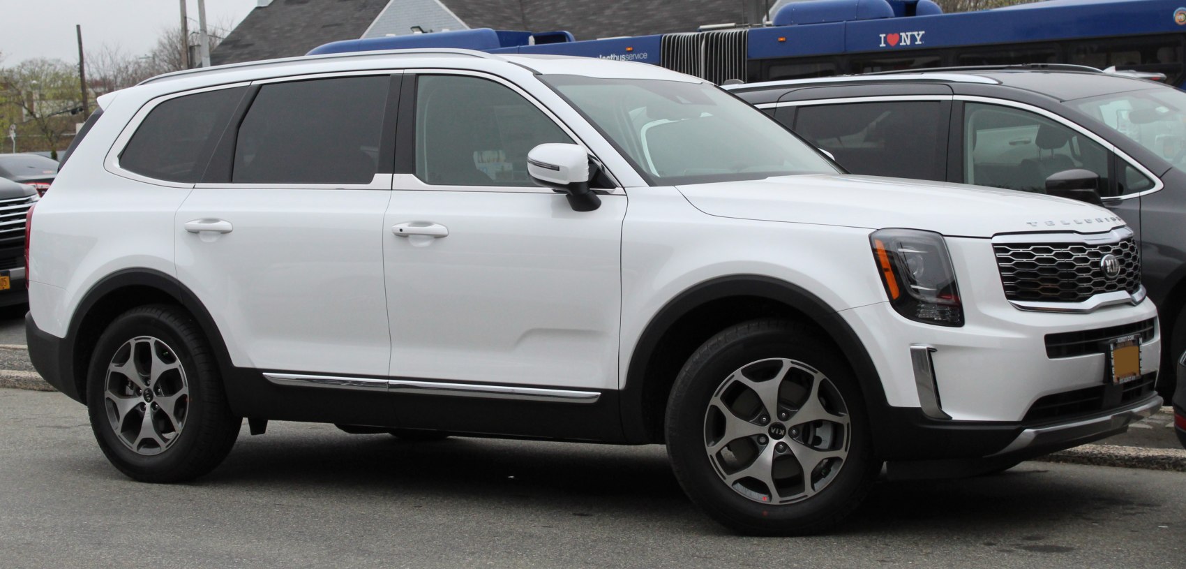 Side profile of 2020 SUV with bold grille and LED headlights