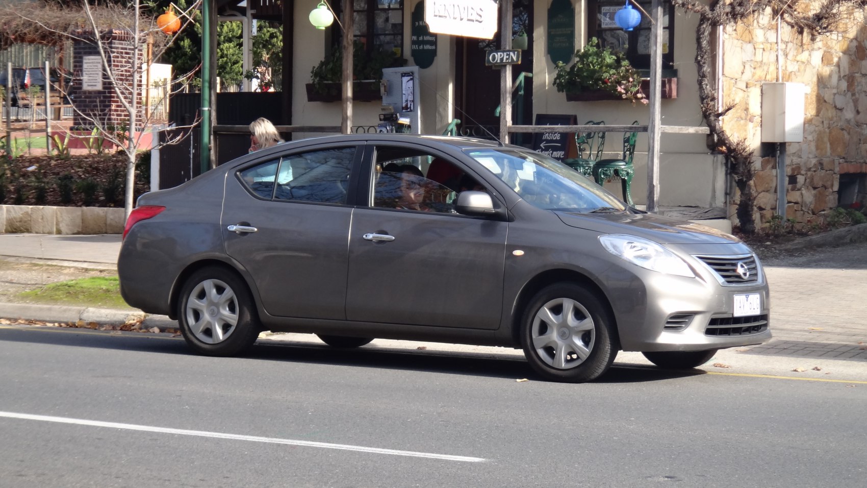Side profile of a compact four-door sedan