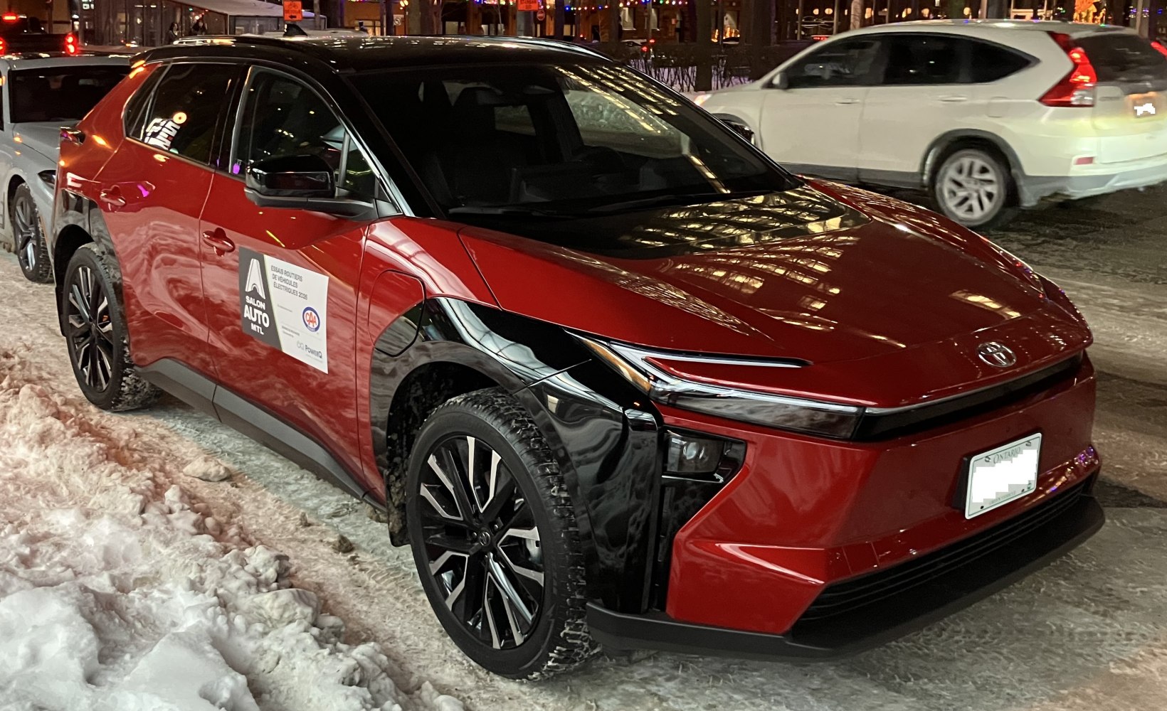 Modern electric SUV with LED headlights and black accent design