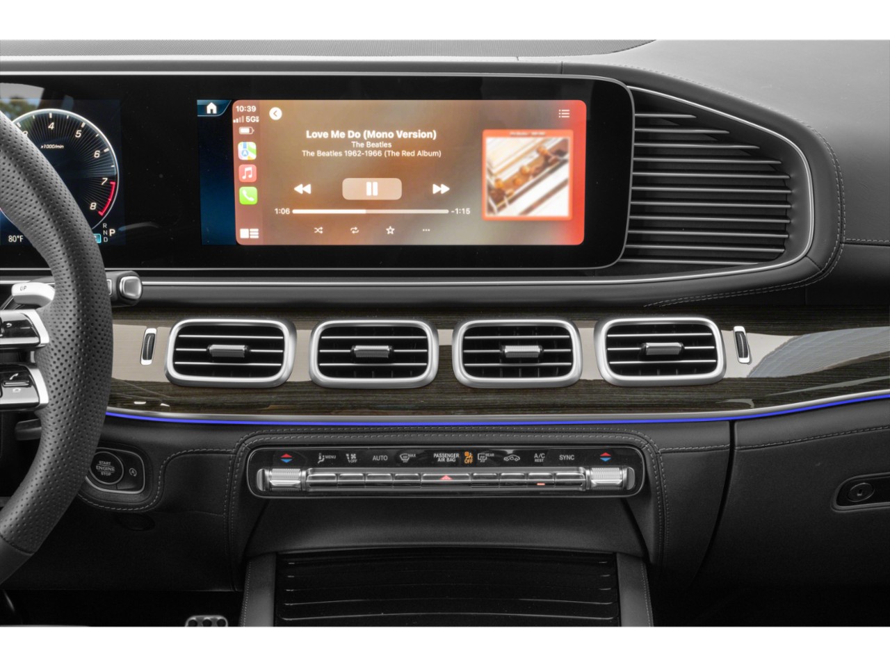 Digital infotainment screen and climate control panel with air vents