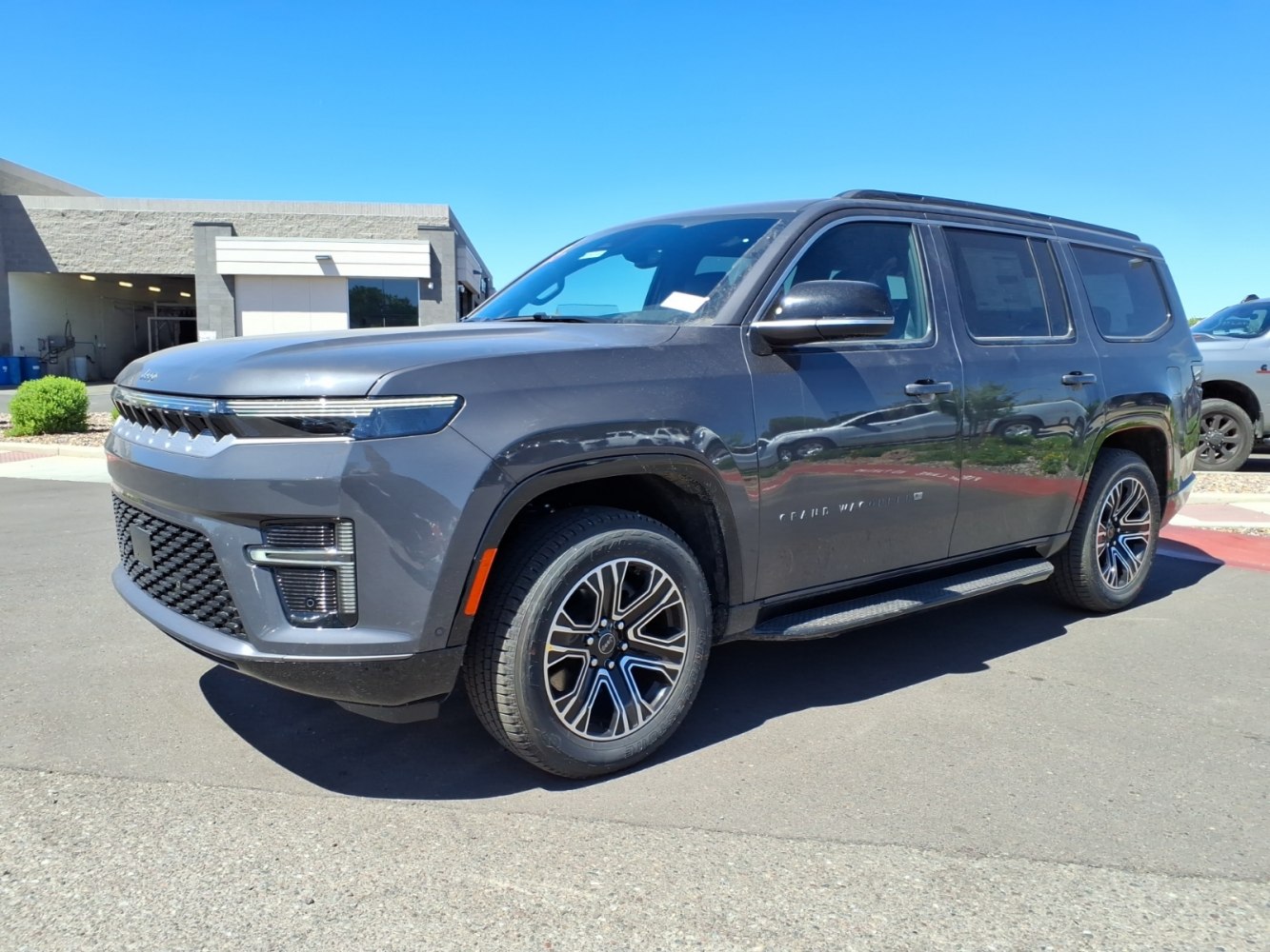 Modern large SUV with LED headlamps and alloy wheels