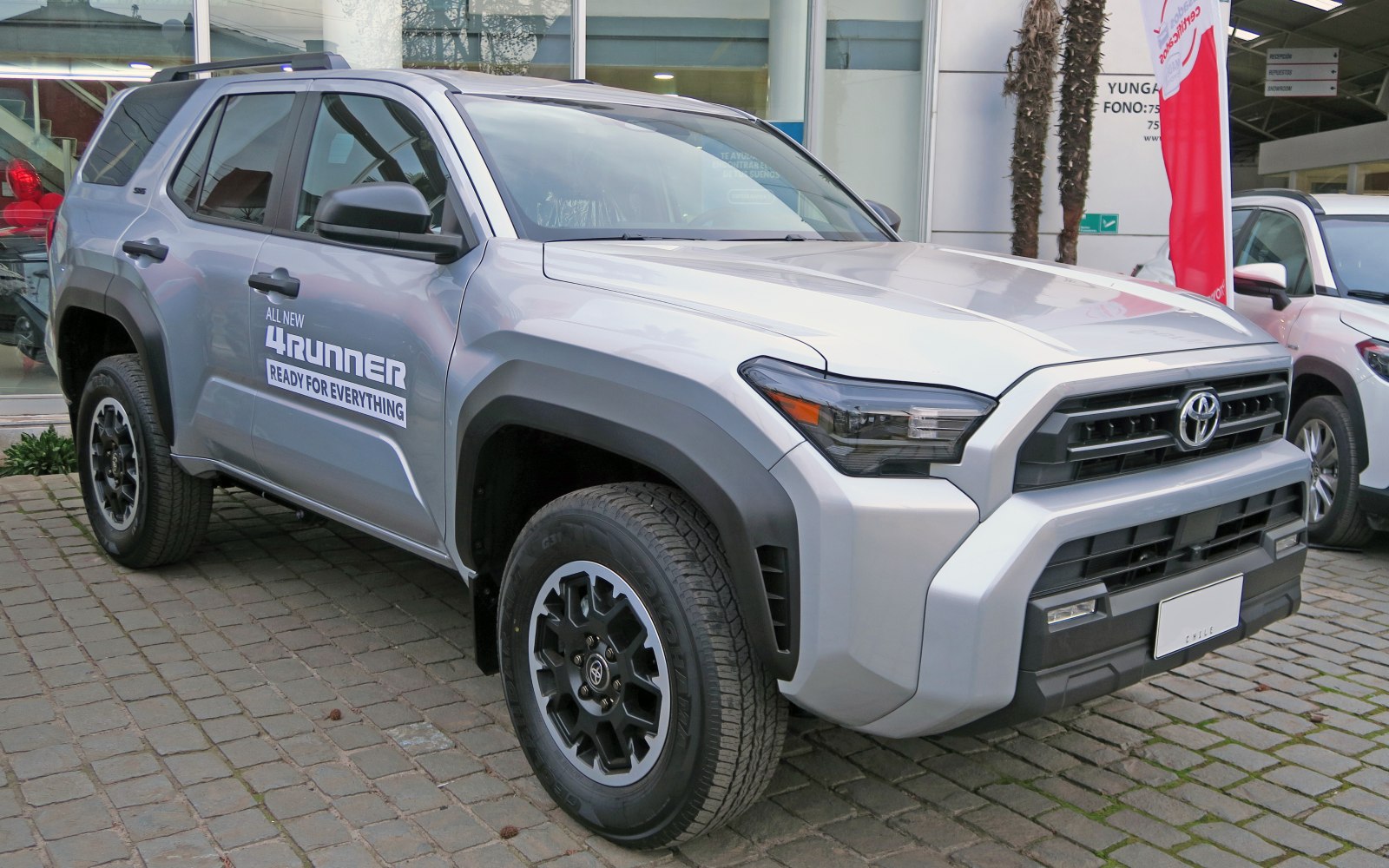 SUV with bold front grille and all-terrain tires