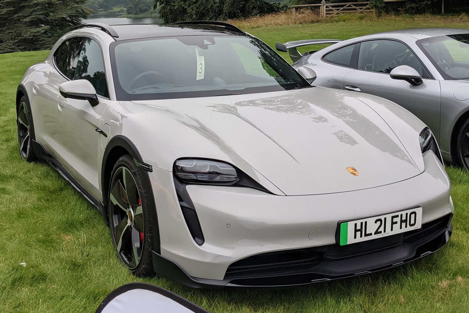 Electric SUV front profile with distinct headlights and sporty wheels