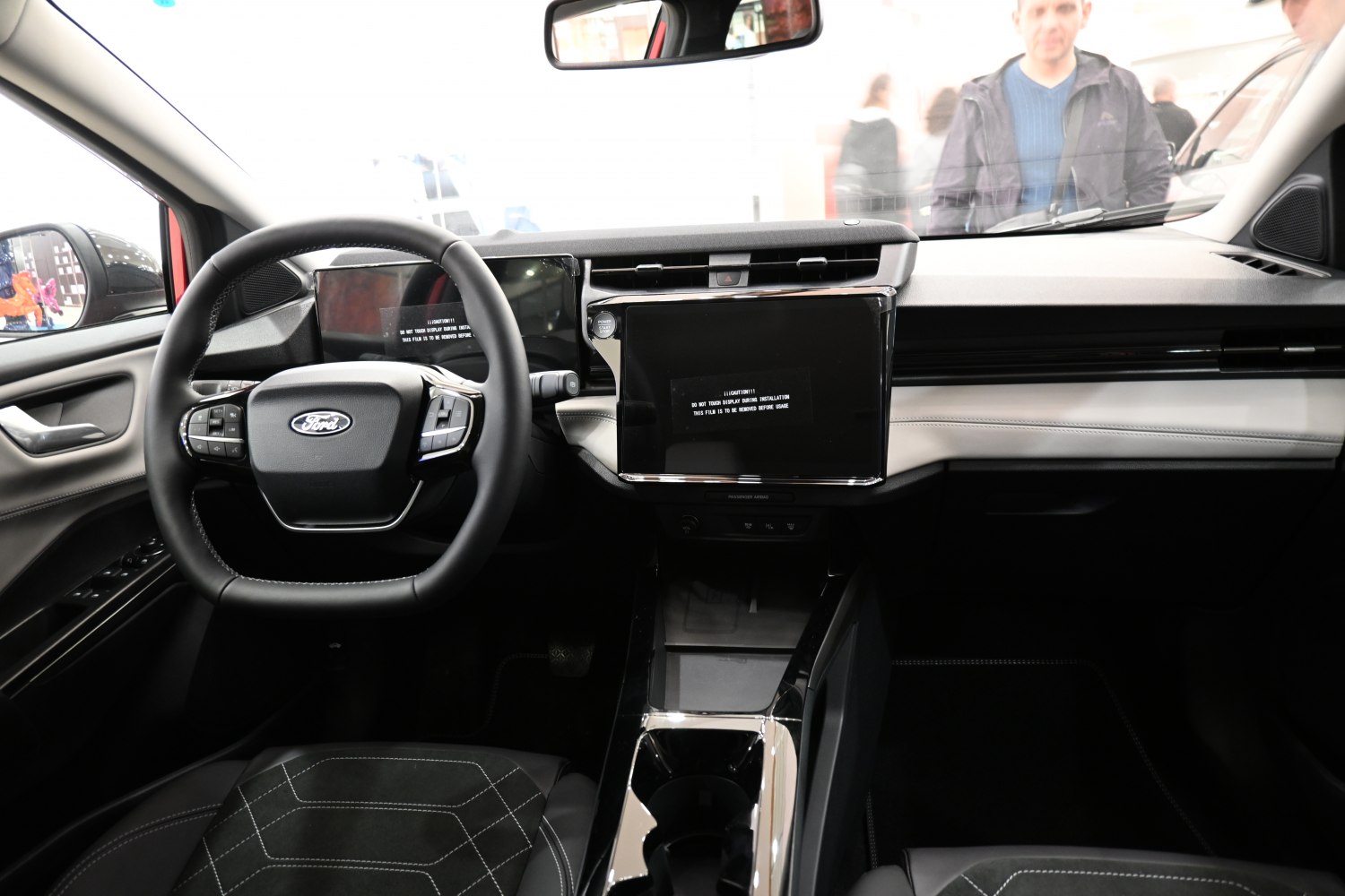 Modern car interior with dashboard and multifunction steering wheel