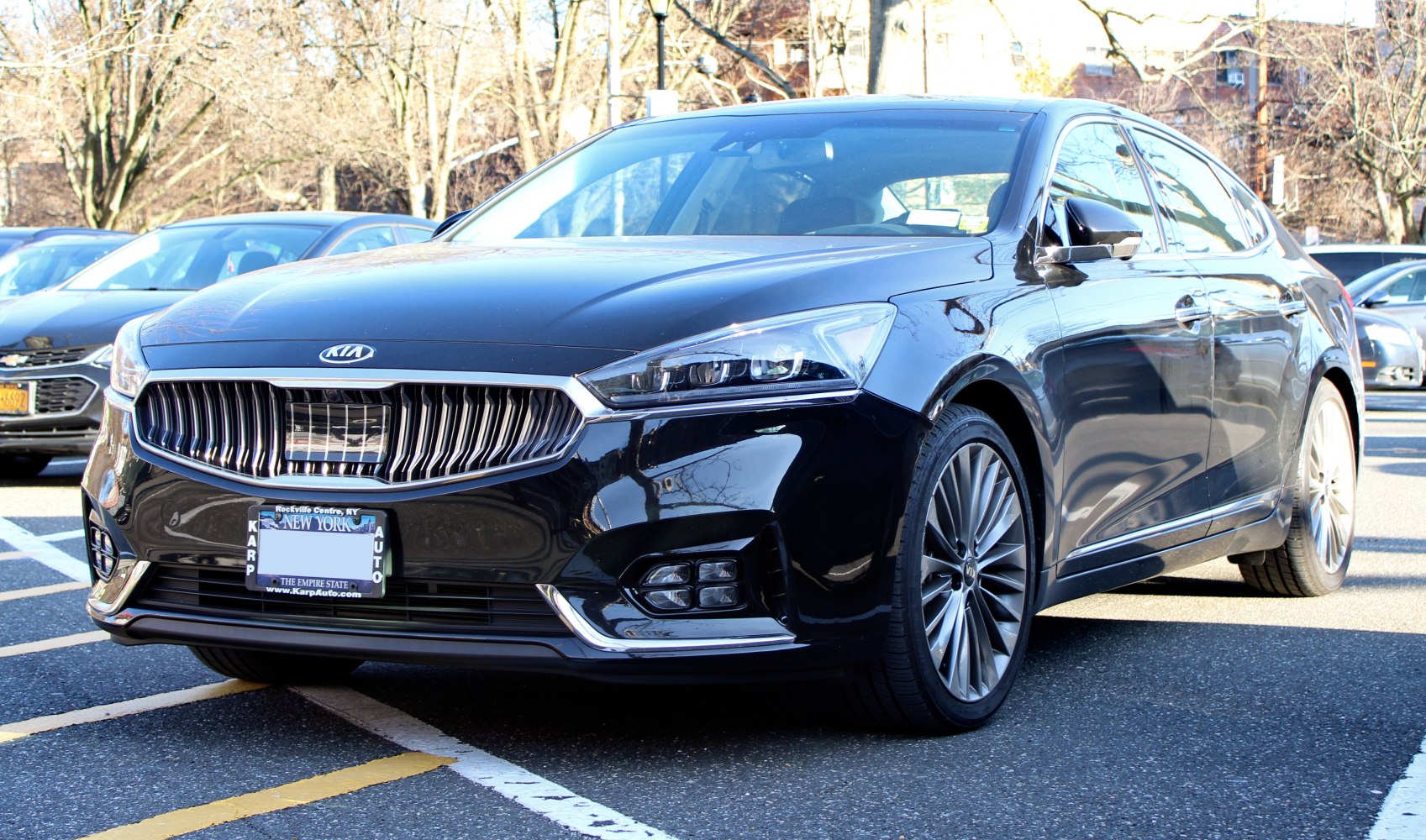 Front view with vertical slat grille and angular LED headlights
