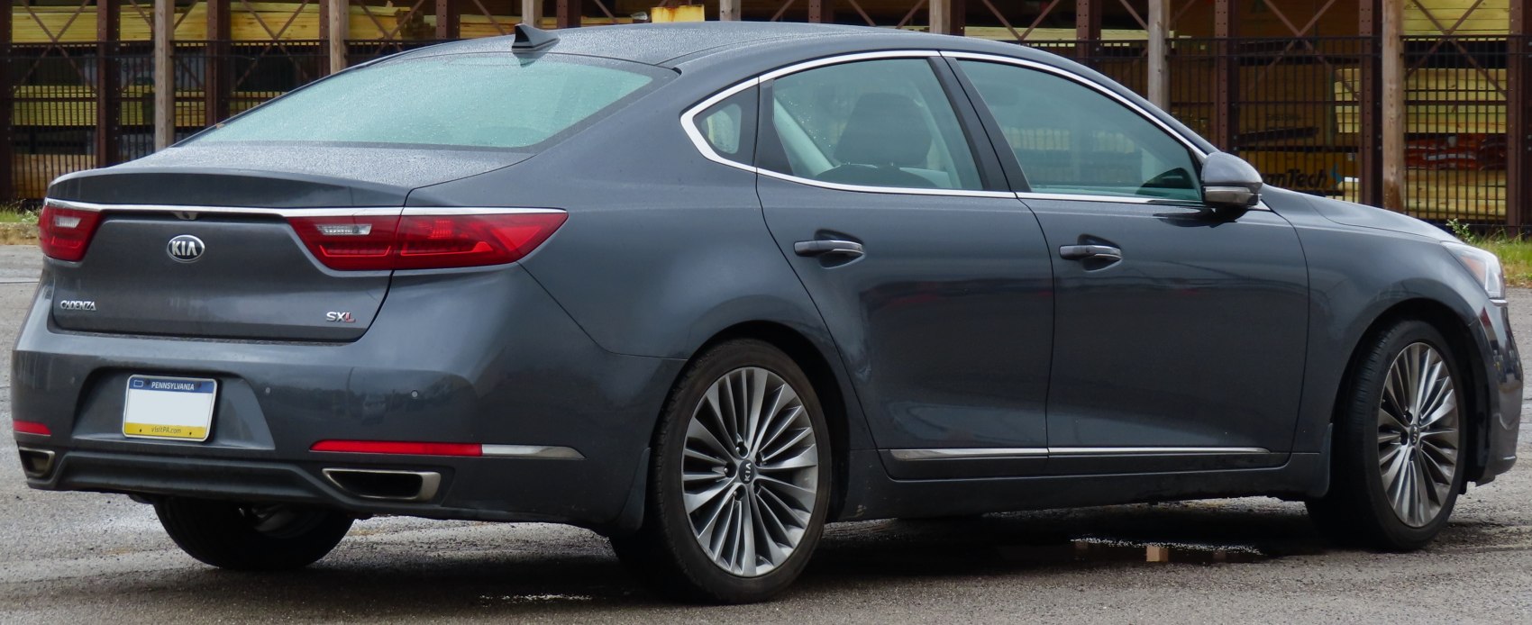 Rear and side profile with taillights and alloy wheels