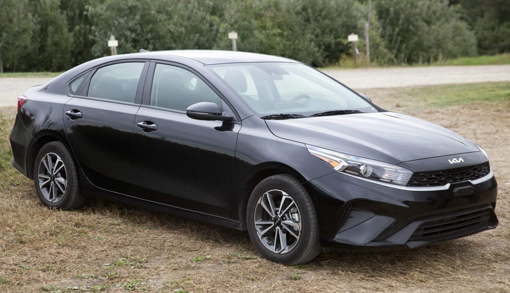 Front side view with sleek headlights and alloy wheels
