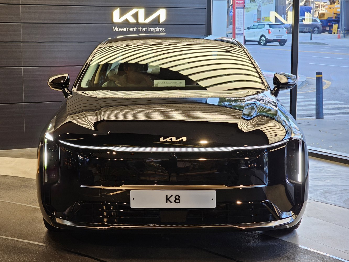 Front view with LED light strip and modern grille design