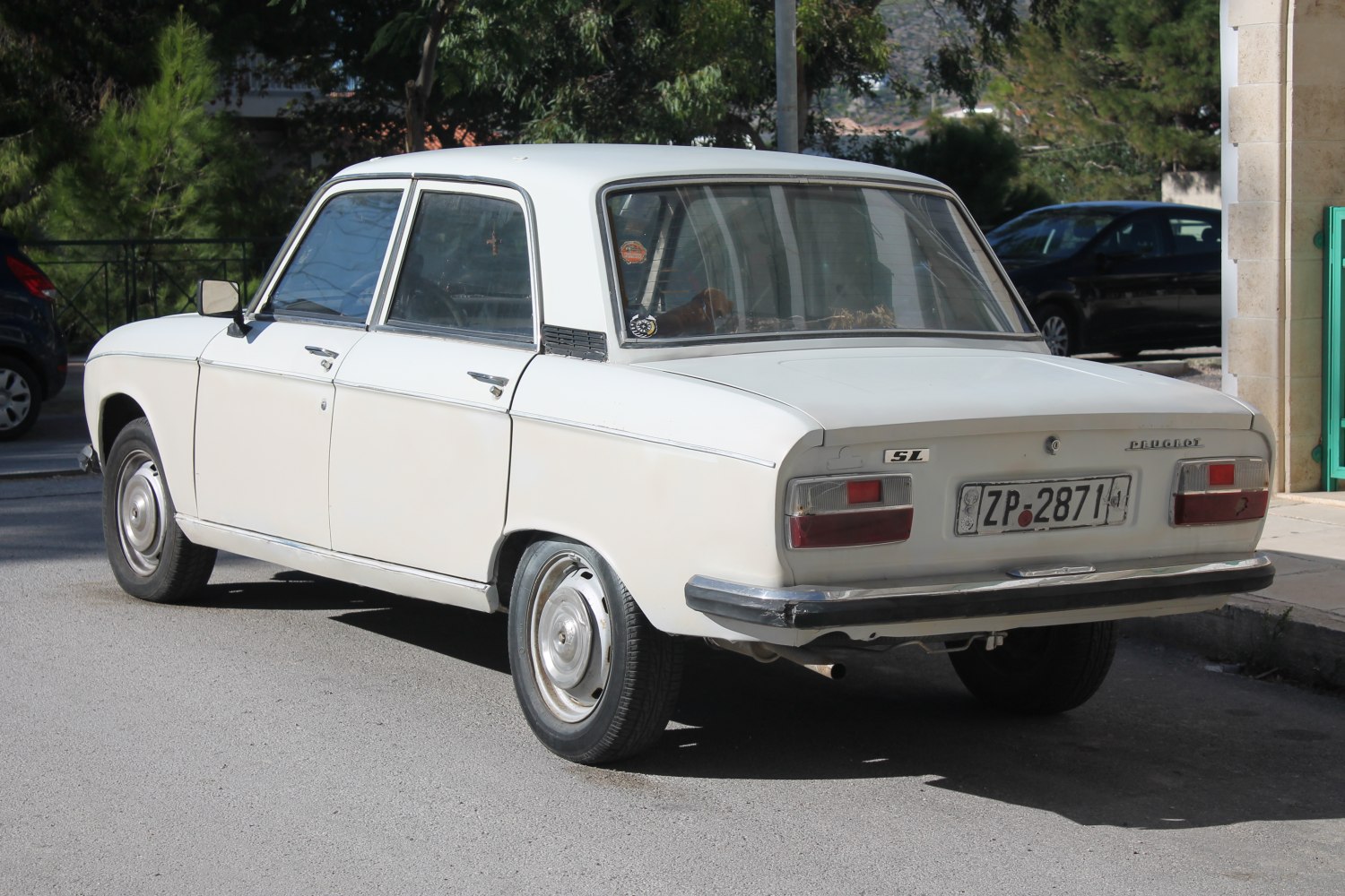 Rear view of classic vintage sedan with distinctive taillights