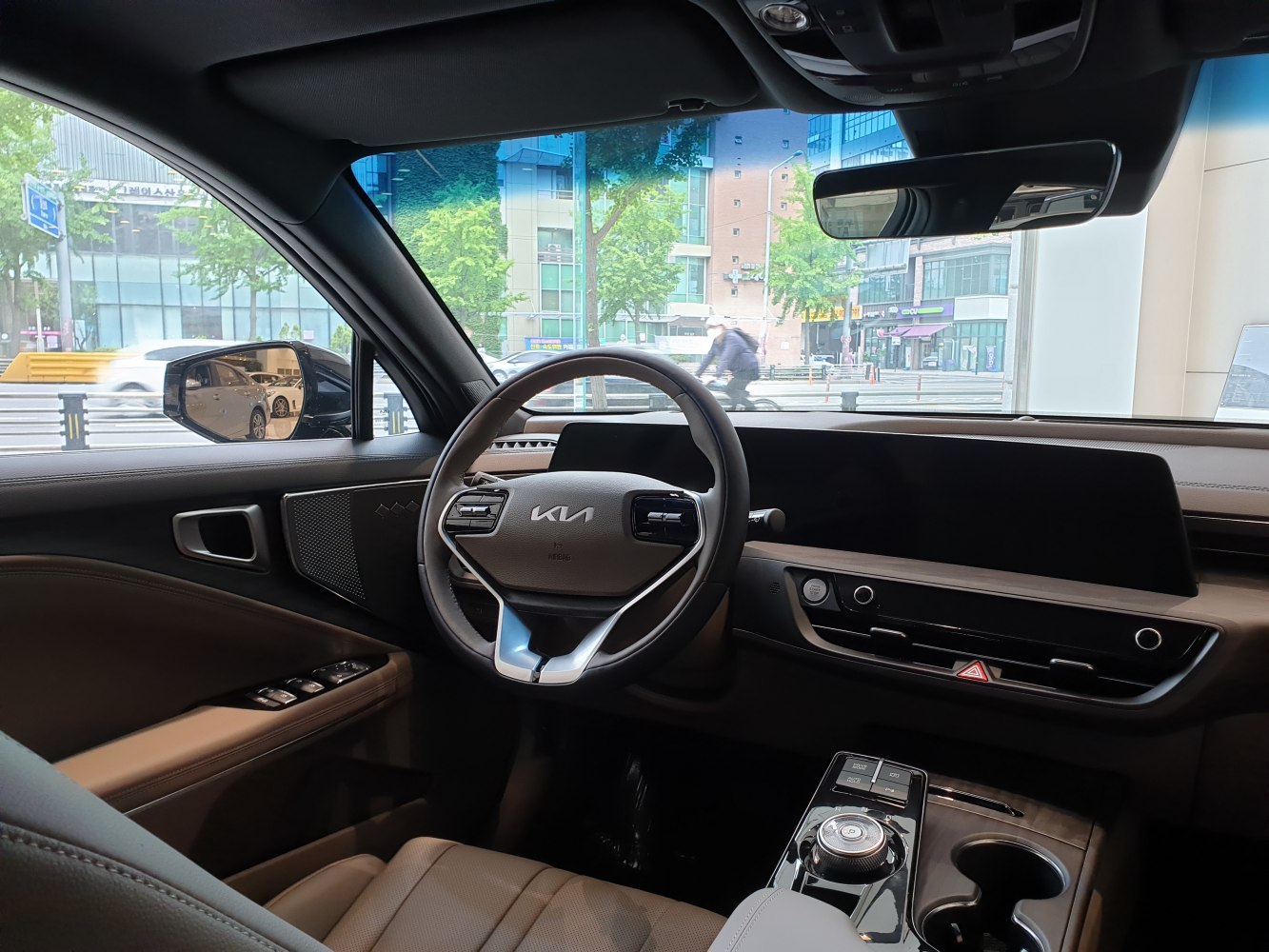 Digital dashboard and modern steering wheel in car interior