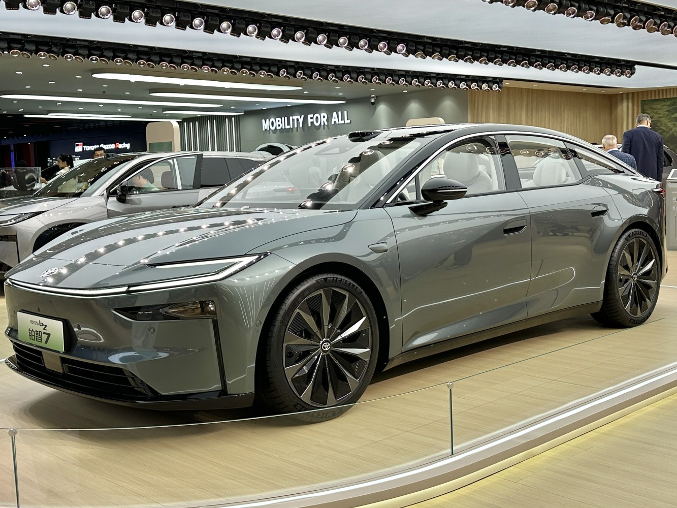 Sleek electric sedan with sharp LED headlights and aerodynamic design