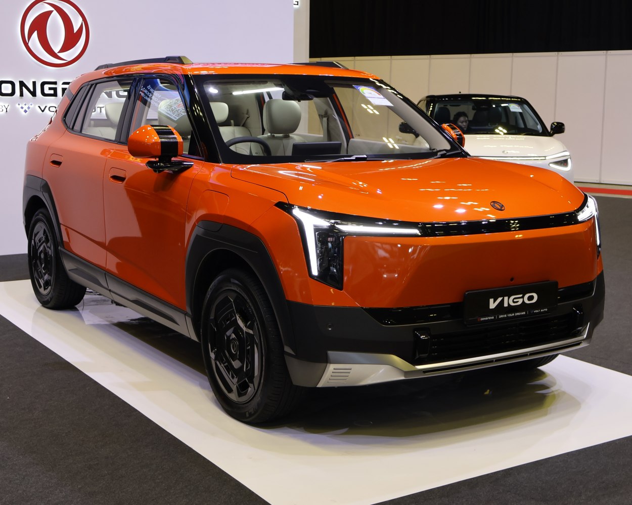 Sleek front view of modern electric SUV with LED headlights