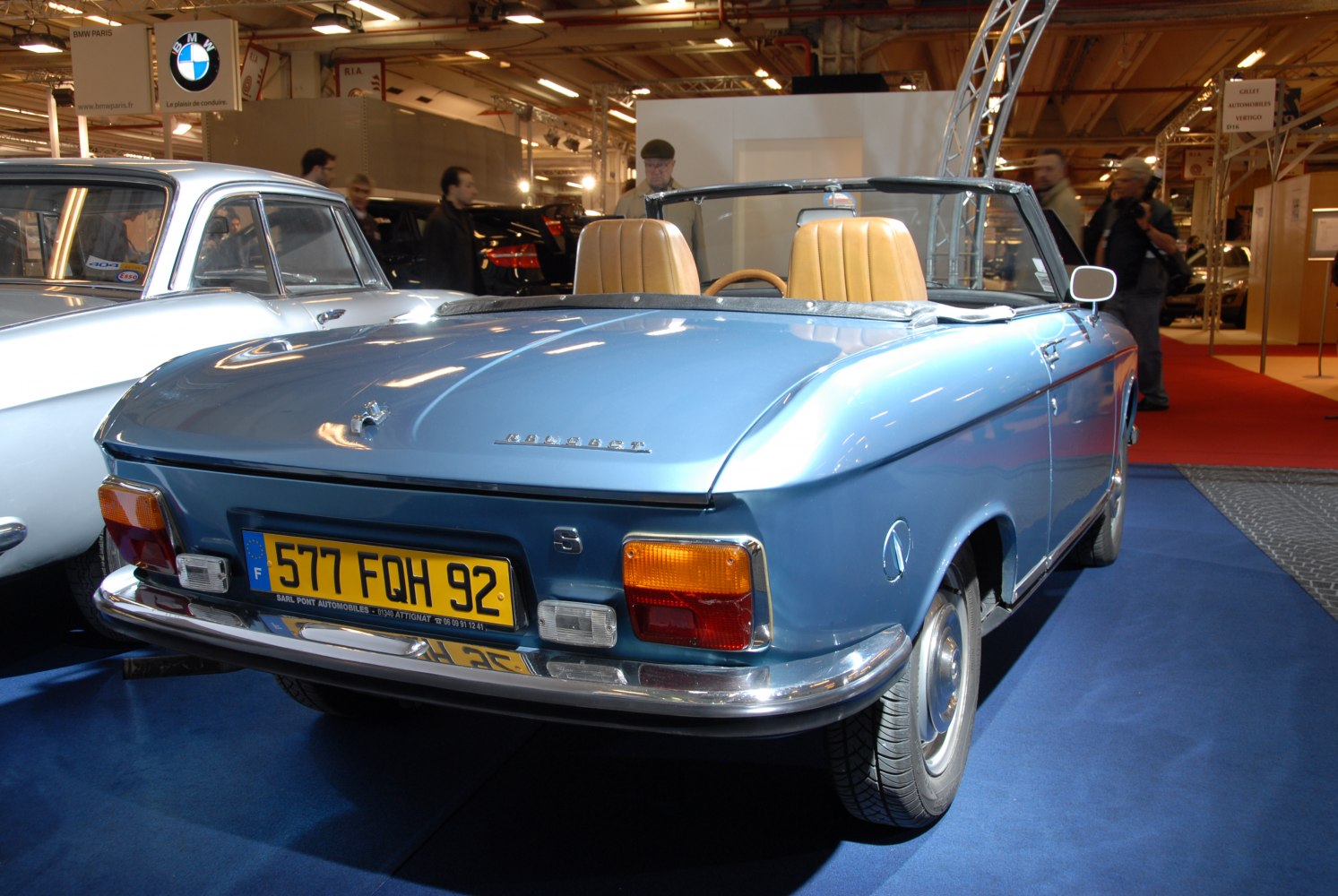 Rear view of vintage convertible with chrome bumper and distinctive tail lights