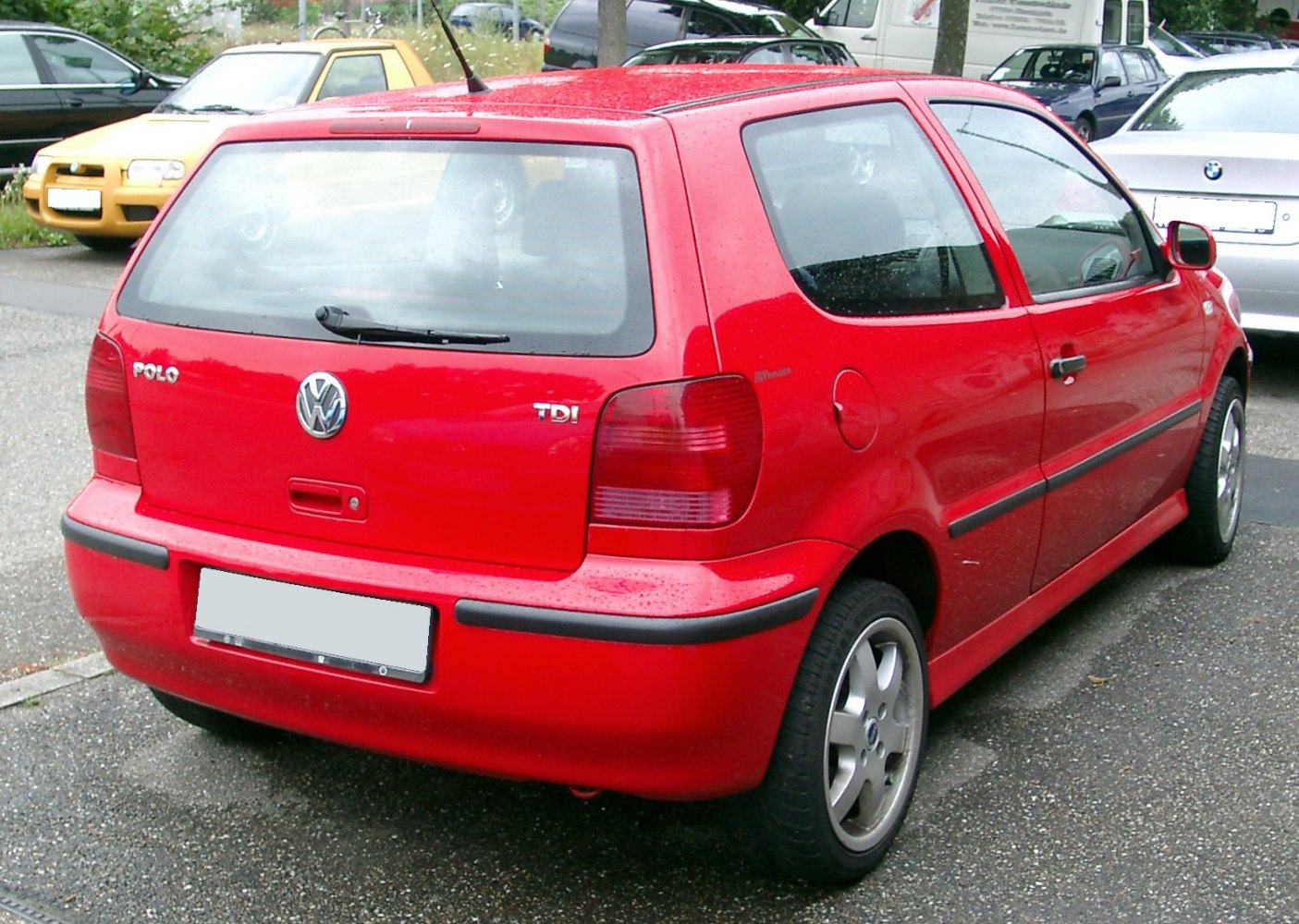 Red 3-door hatchback rear view with TDI badge