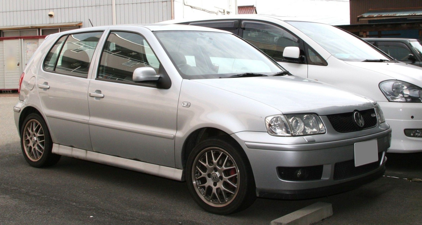 Silver 5-door hatchback with sporty alloy wheels