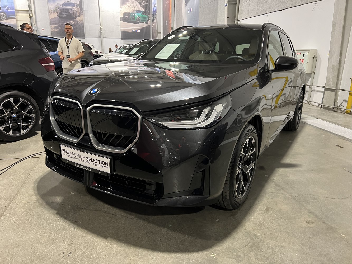 Front view of SUV with large kidney grille and LED headlights