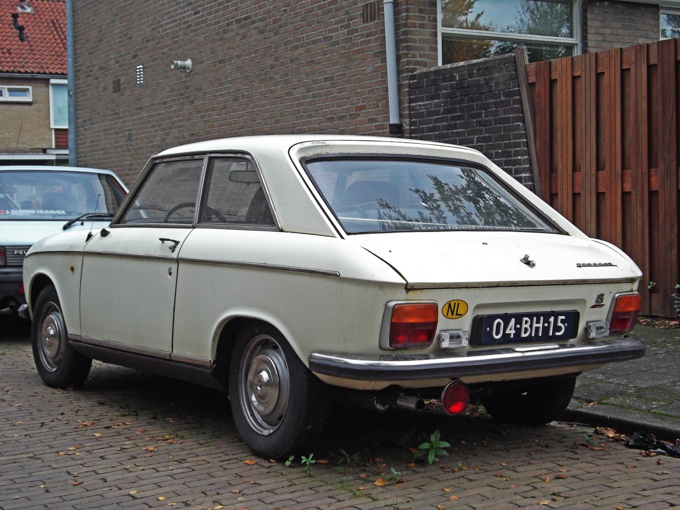 Rear view of vintage 1970s coupe with hatchback design