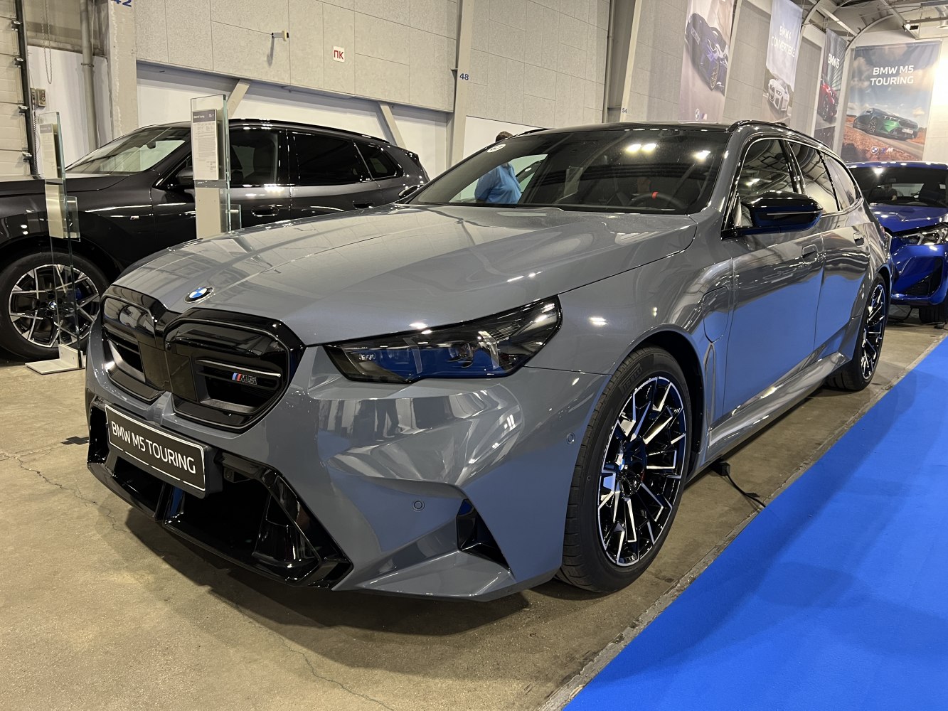 Aggressive front grille and sporty alloy wheels on a station wagon