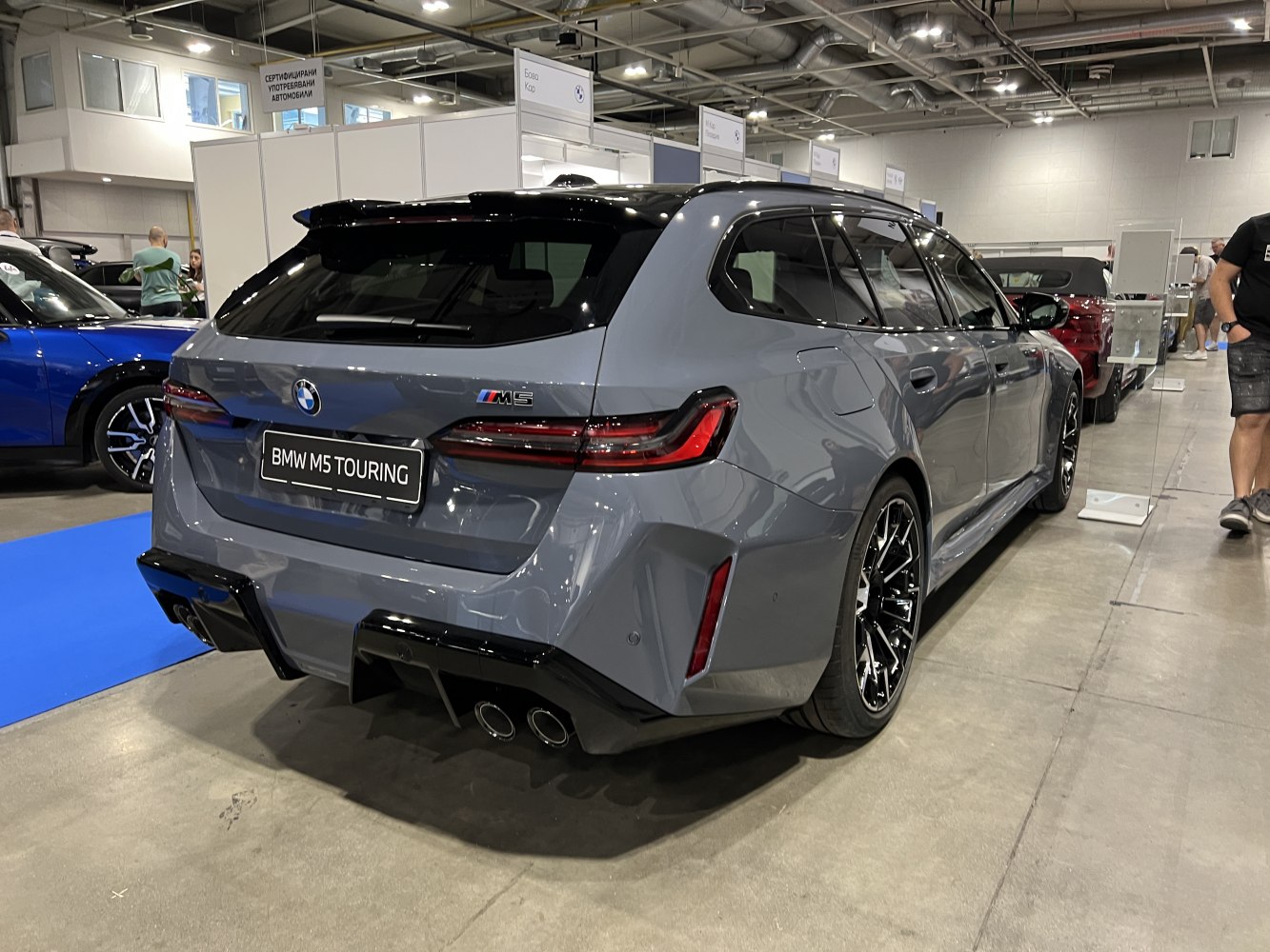 Rear view with quad exhaust and sleek taillights