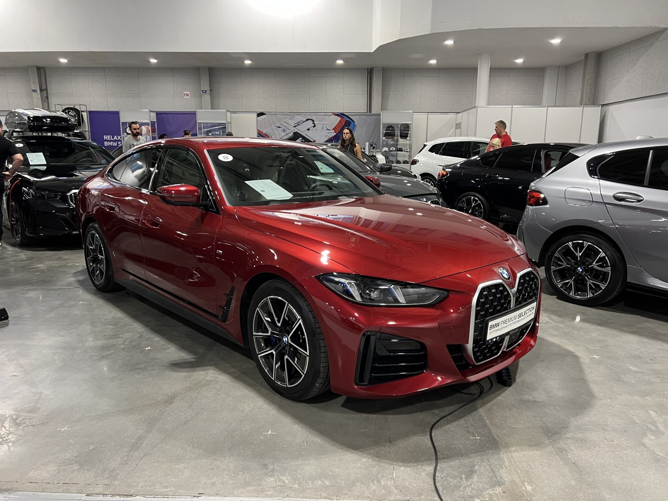 Sporty luxury sedan with large aggressive front grille and sleek body lines