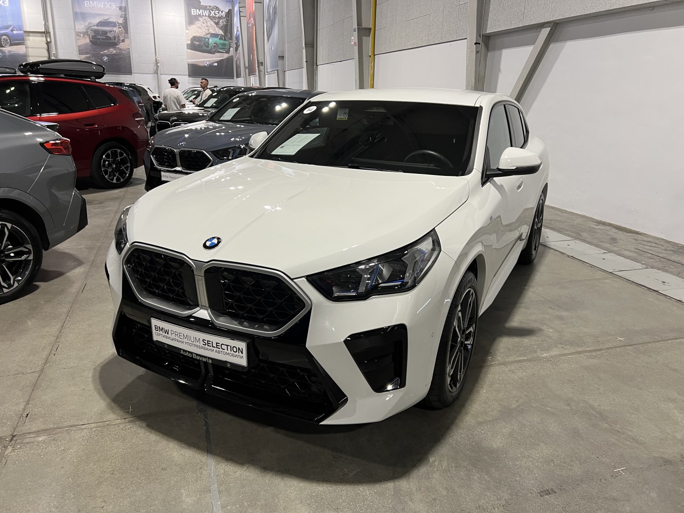 White compact SUV with dual kidney grille and LED headlights