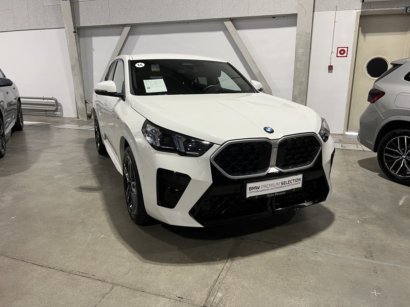Front view with signature kidney grille and angular LED headlights