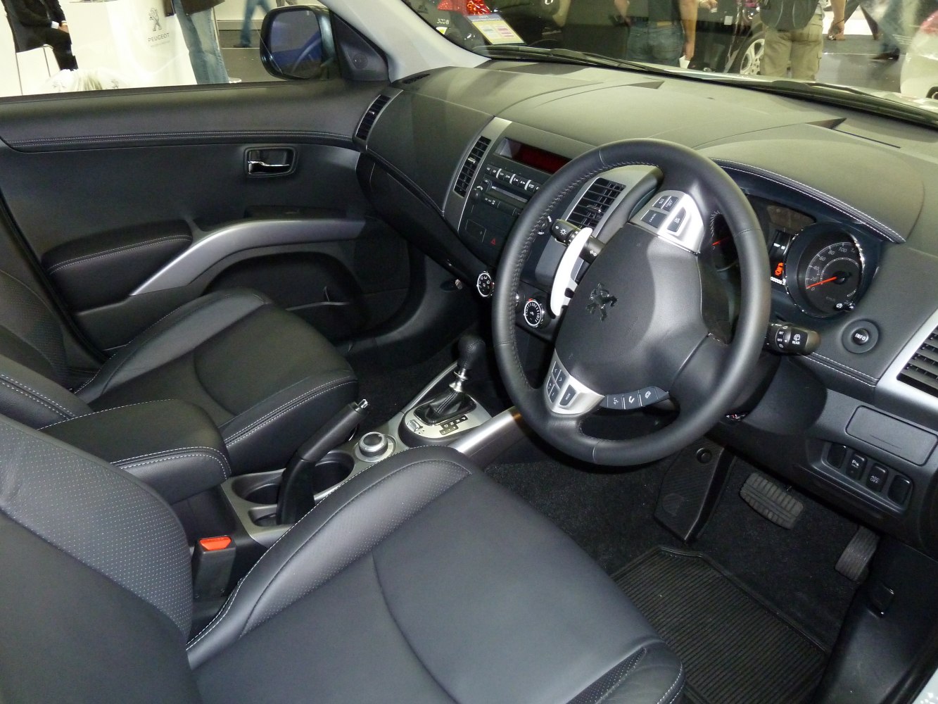 Modern dashboard and leather interior with multifunction steering wheel