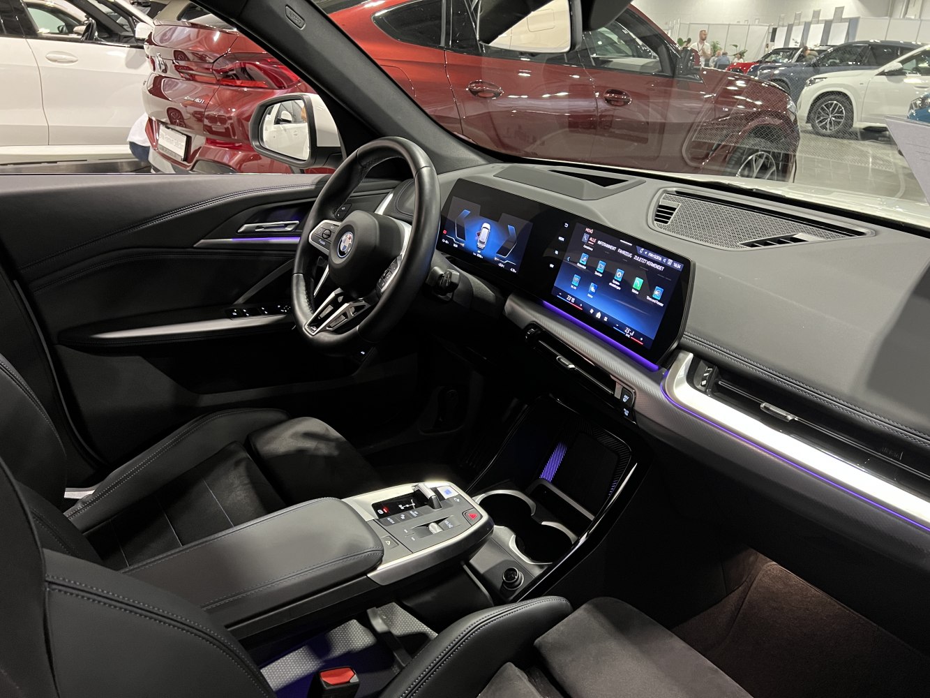 Modern digital dashboard and touchscreen infotainment with premium steering wheel