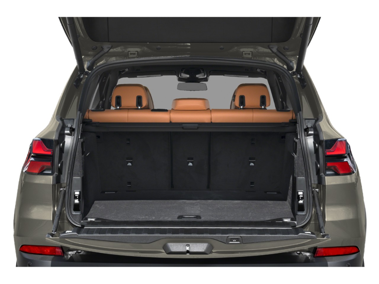 Open trunk with spacious cargo area and visible tan leather rear seats