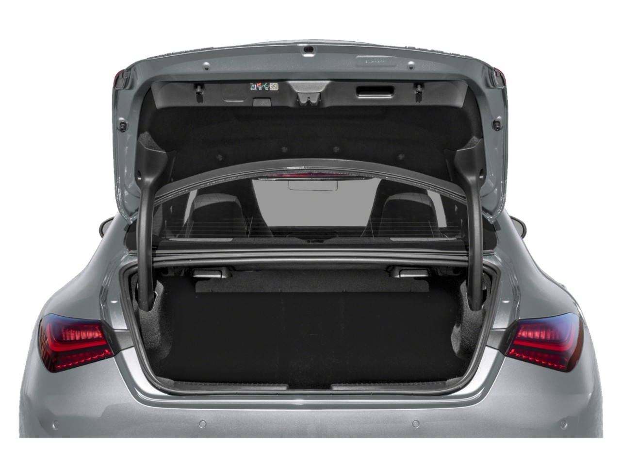 Open trunk and rear taillights of a modern sedan