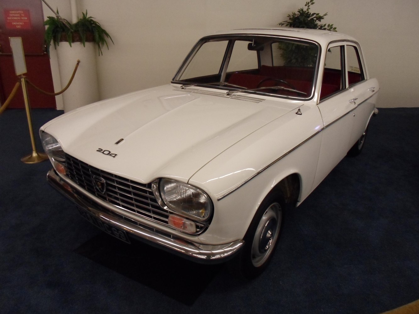 Vintage front grille and headlight design of a classic 1960s sedan