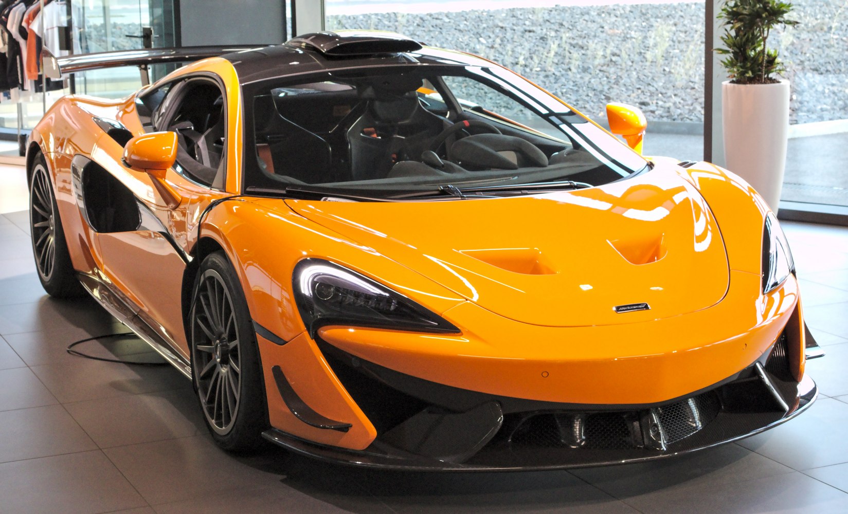 Front close-up highlighting aerodynamic design and LED headlights.