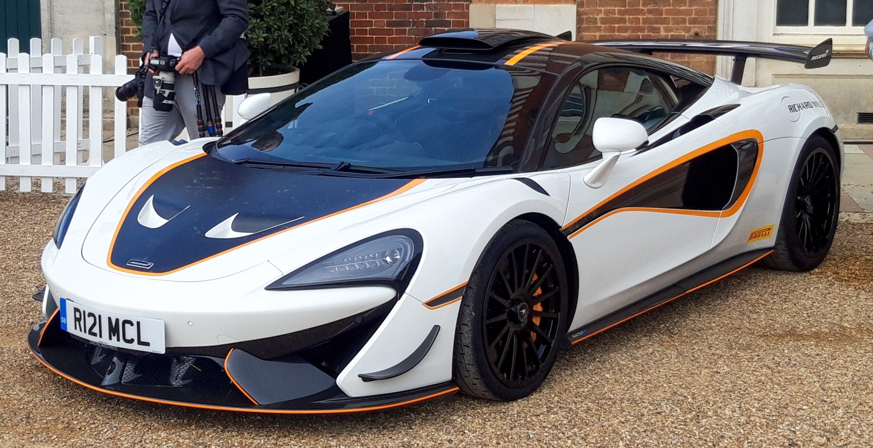Aerodynamic body with large rear wing and racing-inspired details