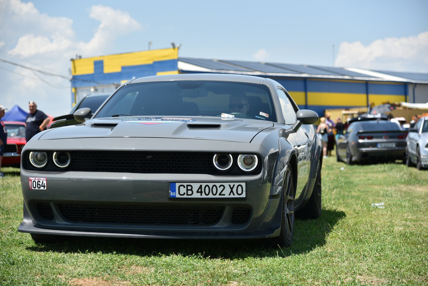Front view with round headlights and aggressive grille