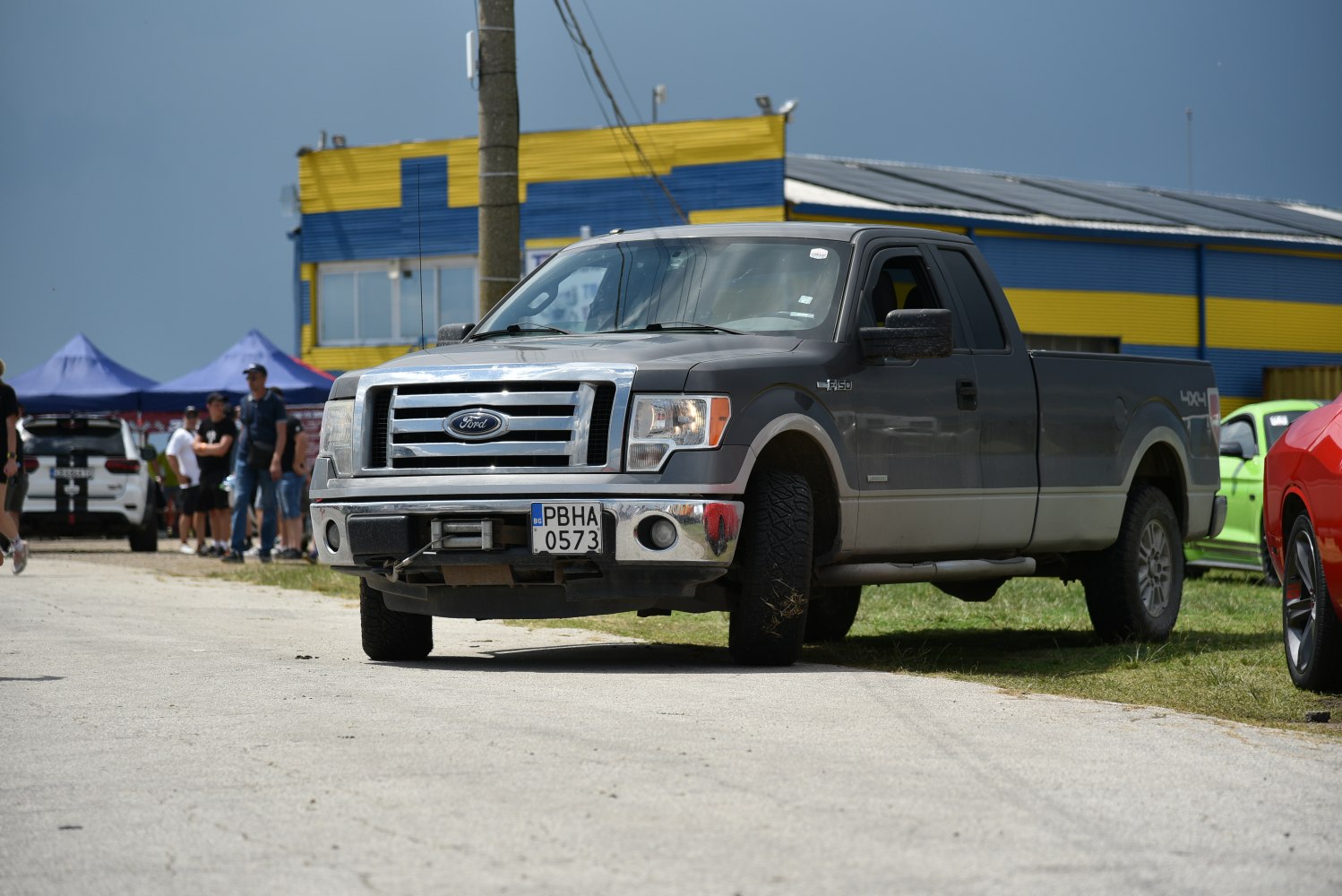 Pickup truck with chrome grille and front winch