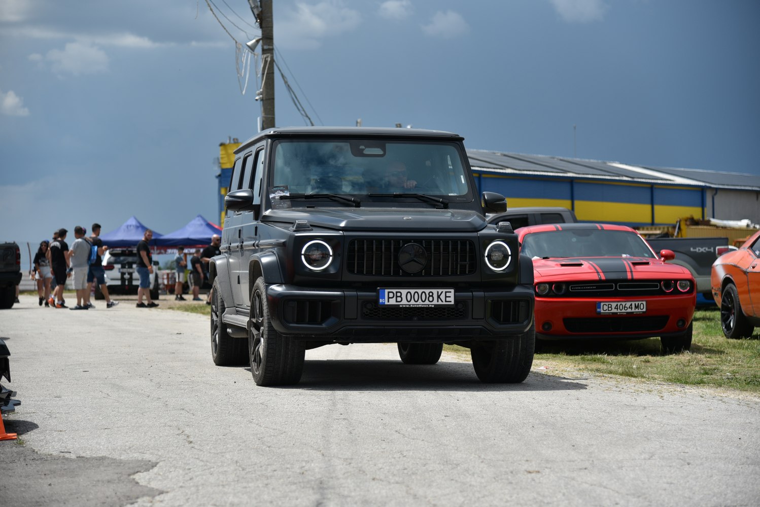 SUV front view with LED circular headlights and bold grille