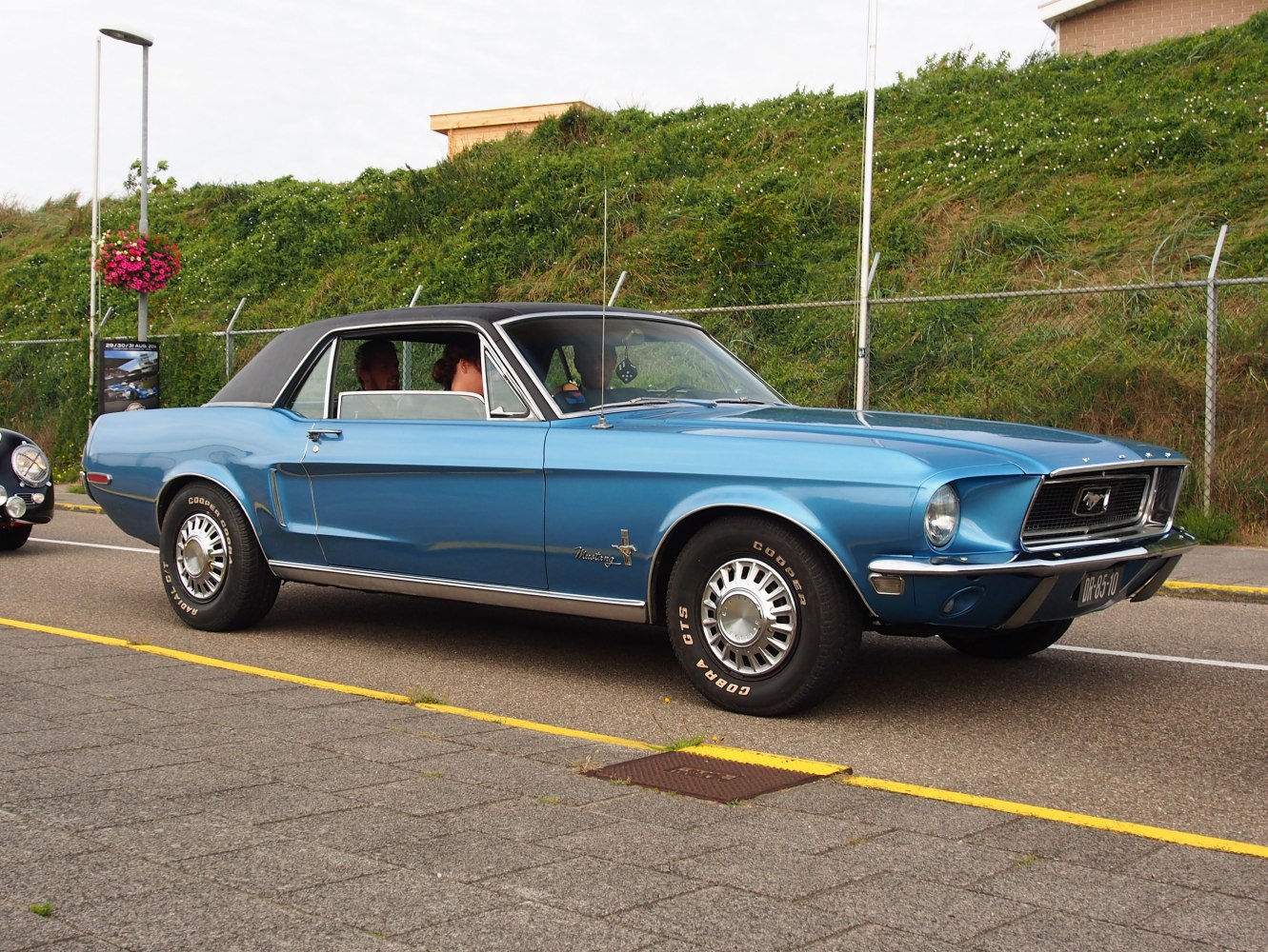 Classic 1960s muscle coupe with hardtop and vintage styling