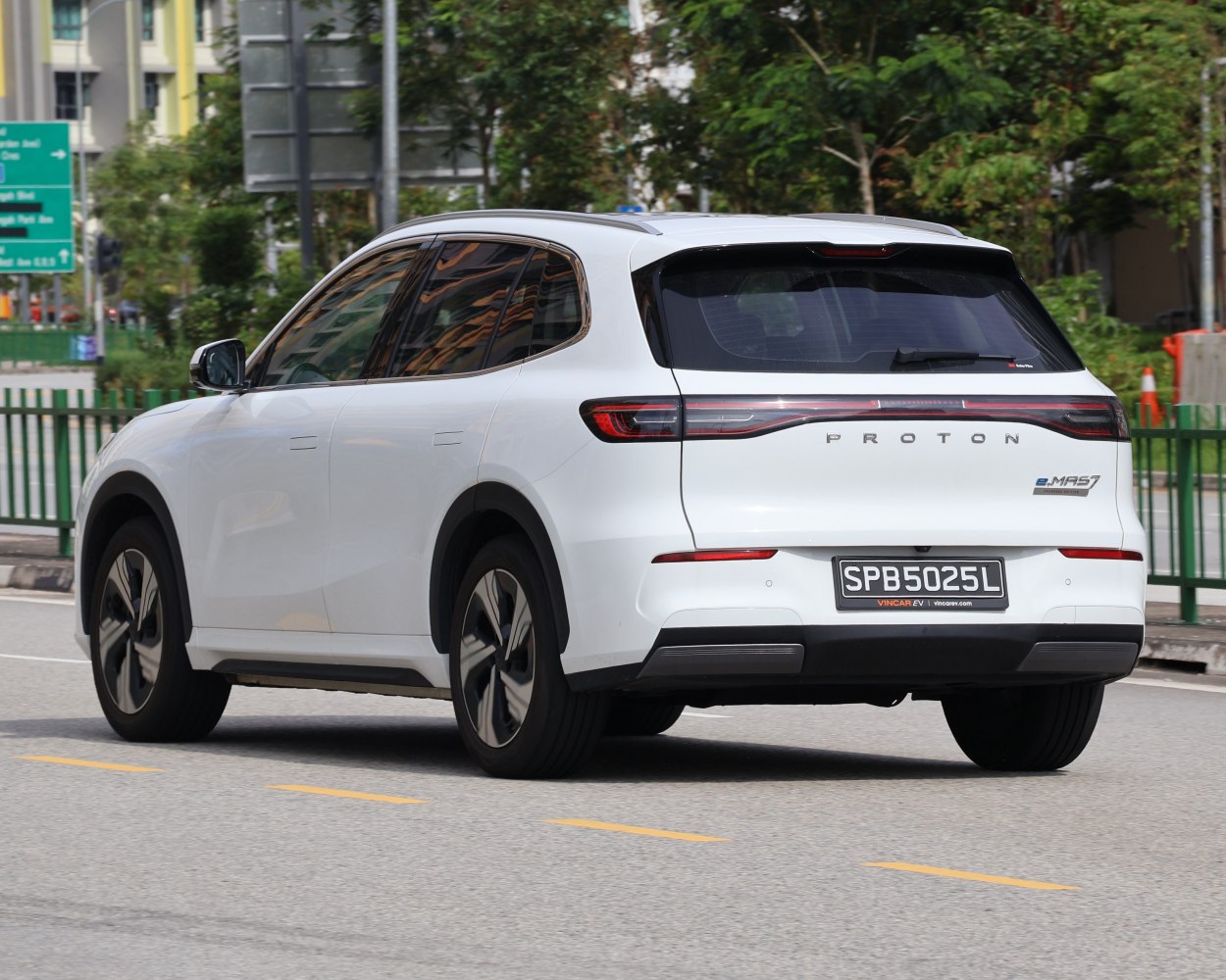 Rear view of sleek modern SUV with LED taillight strip
