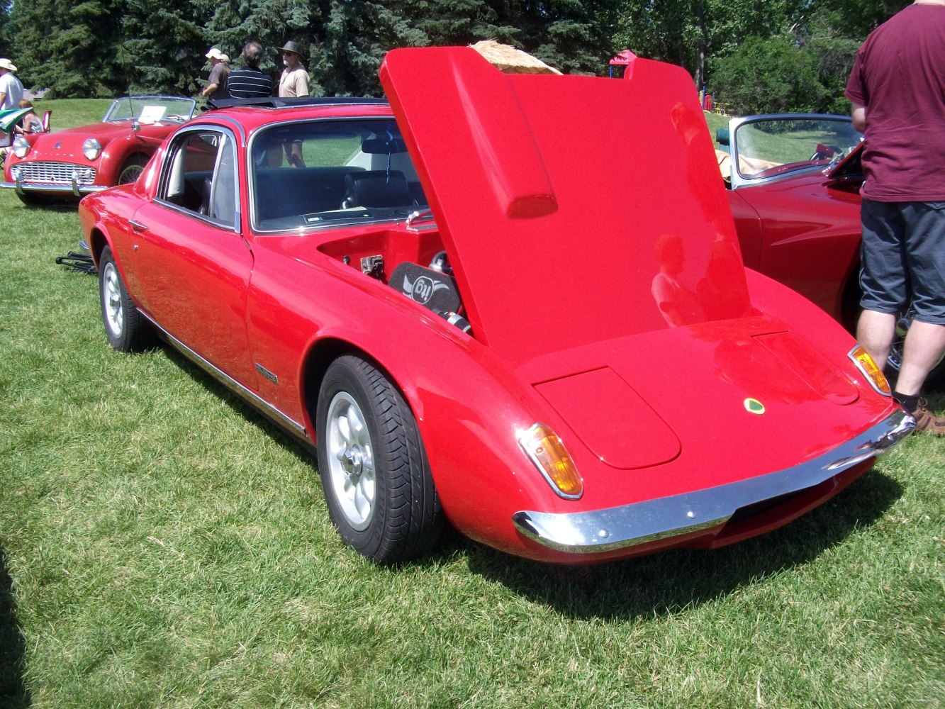 Classic sports coupe with open front hood
