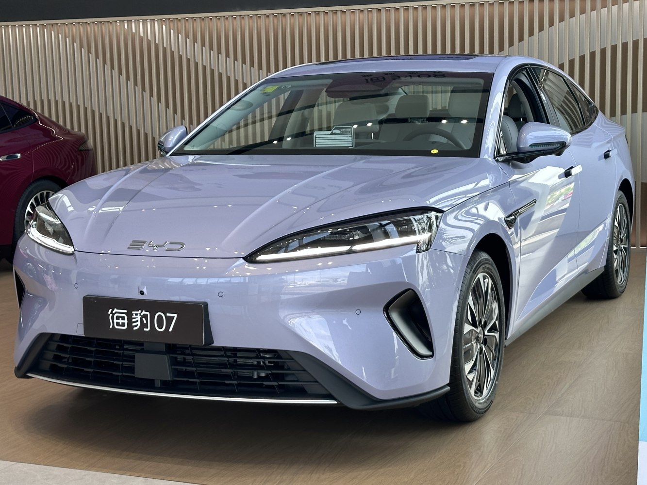 Sleek front view with modern headlights and aerodynamic design