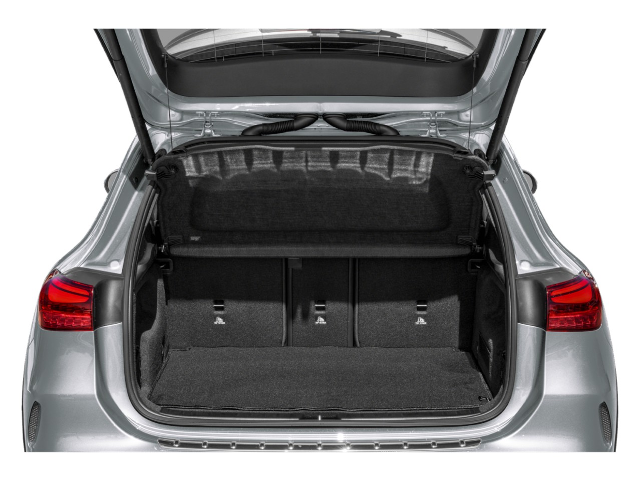Spacious rear cargo area with secure cover and clean trunk space
