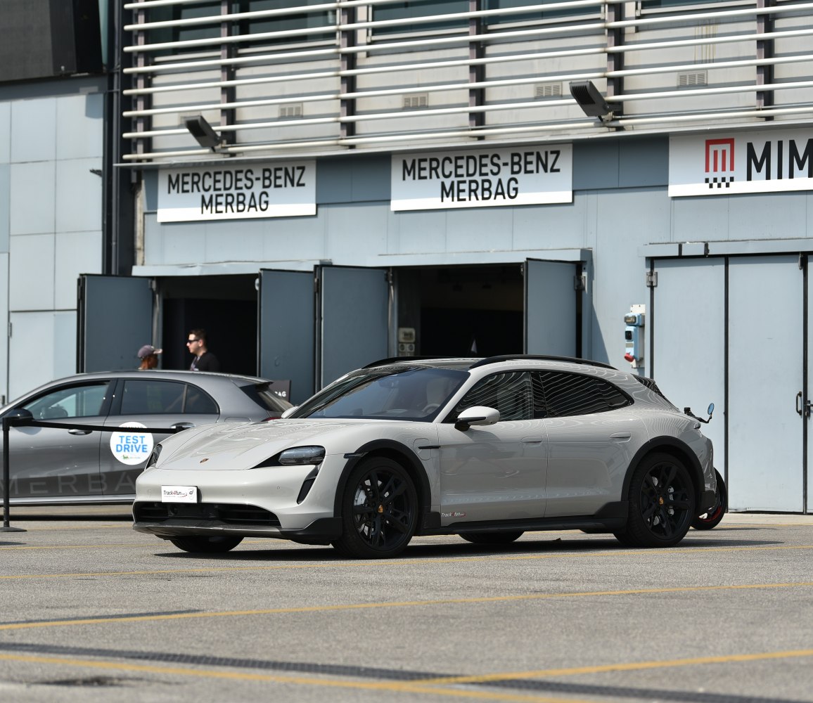 White electric hatchback with black trim and sporty wheels
