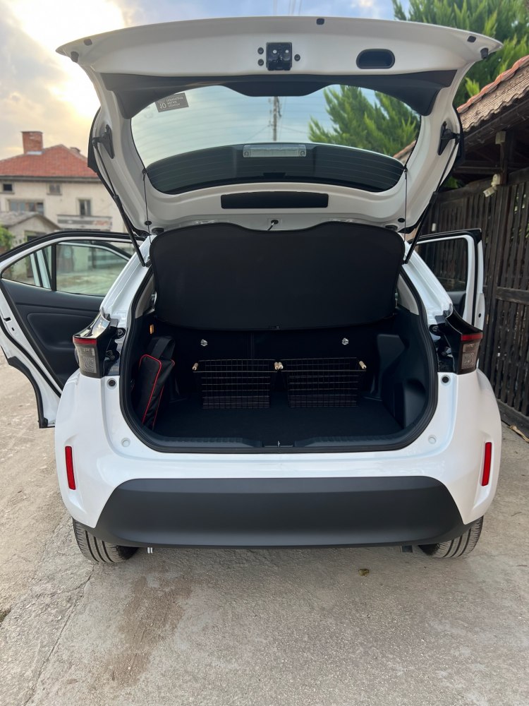 Open trunk with hatchback and rear door open