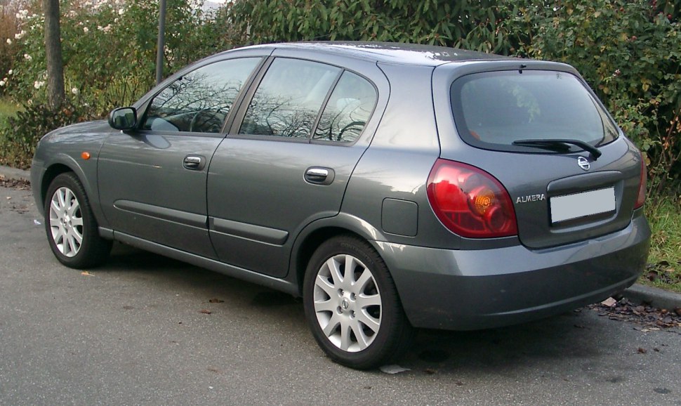 Rear side profile with tail lights and alloy wheels
