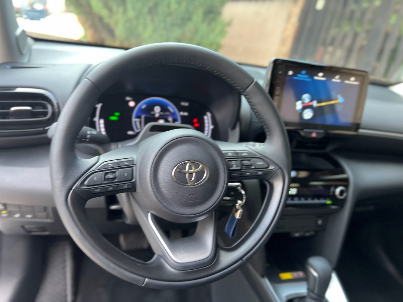Multifunction steering wheel with digital instrument cluster and center display
