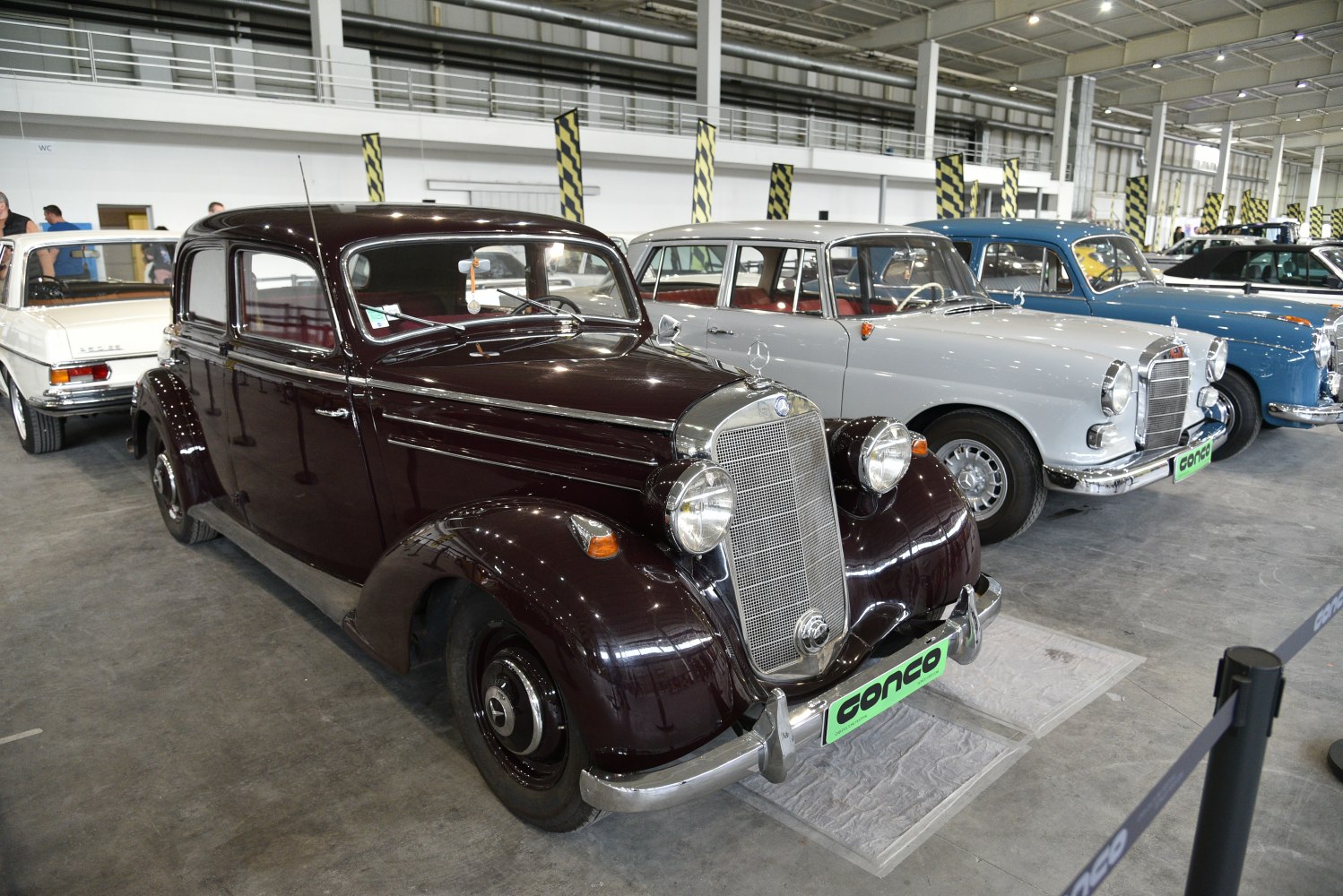 Vintage sedan with prominent front grille and round headlamps