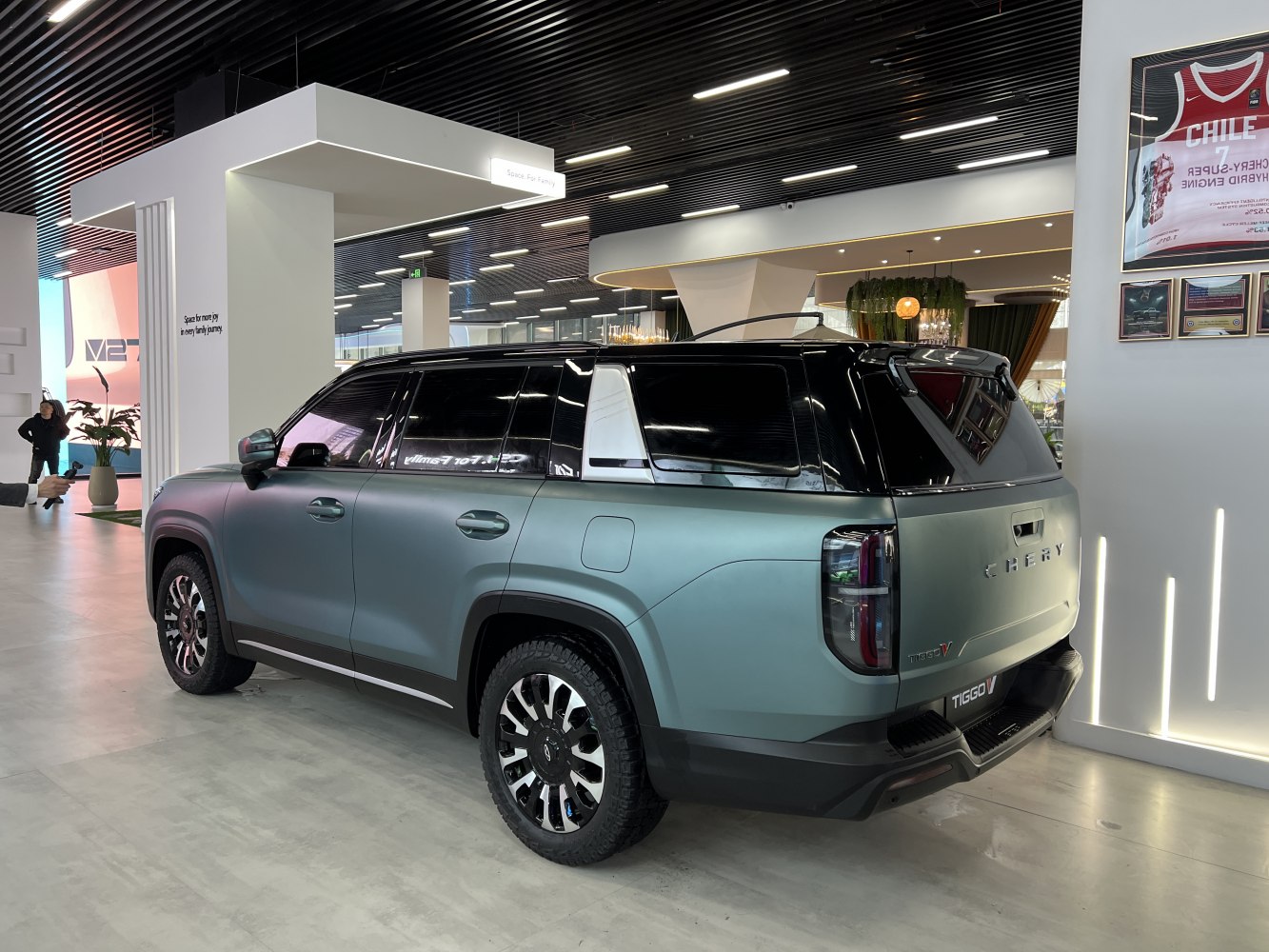 SUV rear and side view in matte finish with rugged wheels and tinted windows