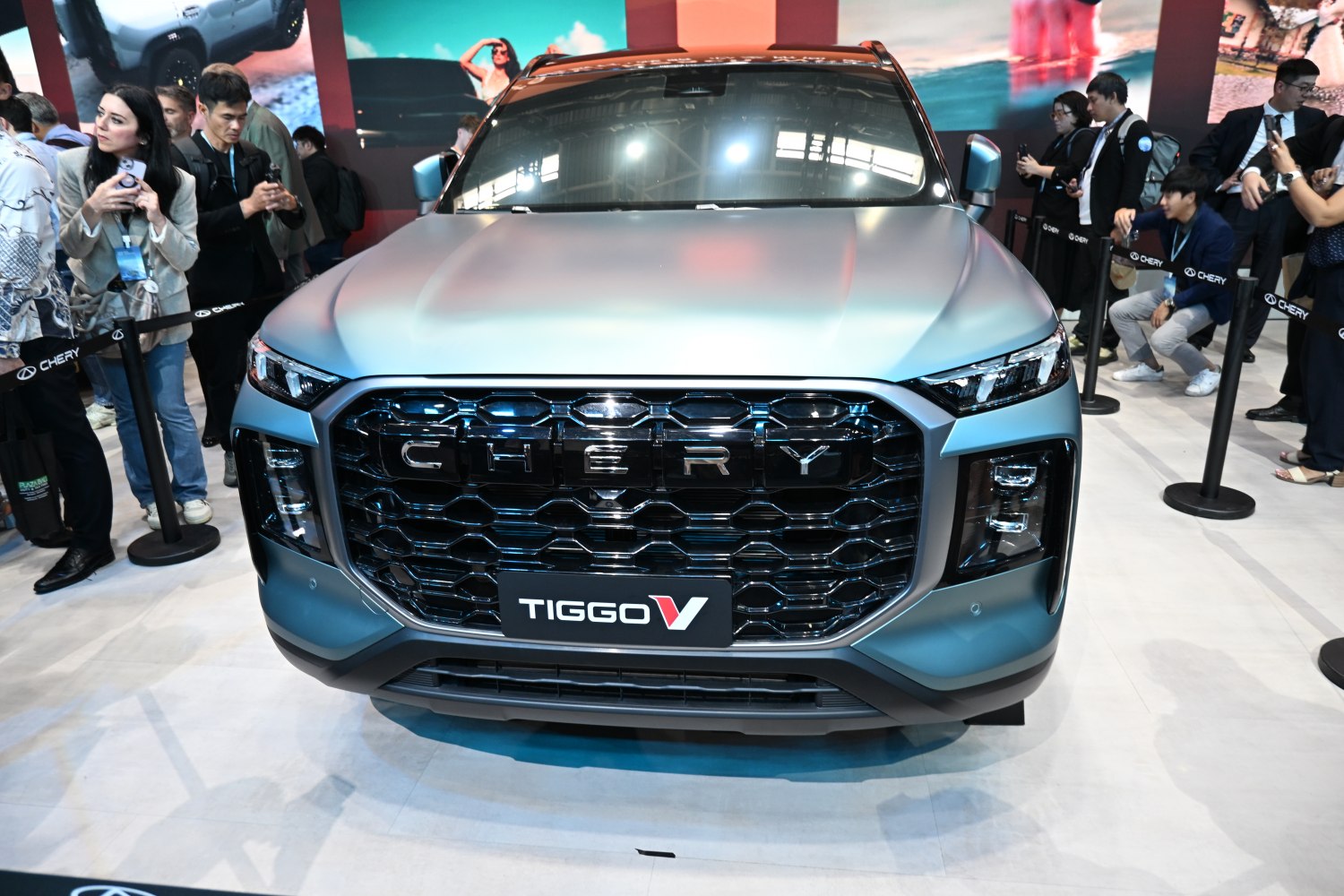 Bold front grille and sleek headlights of modern SUV