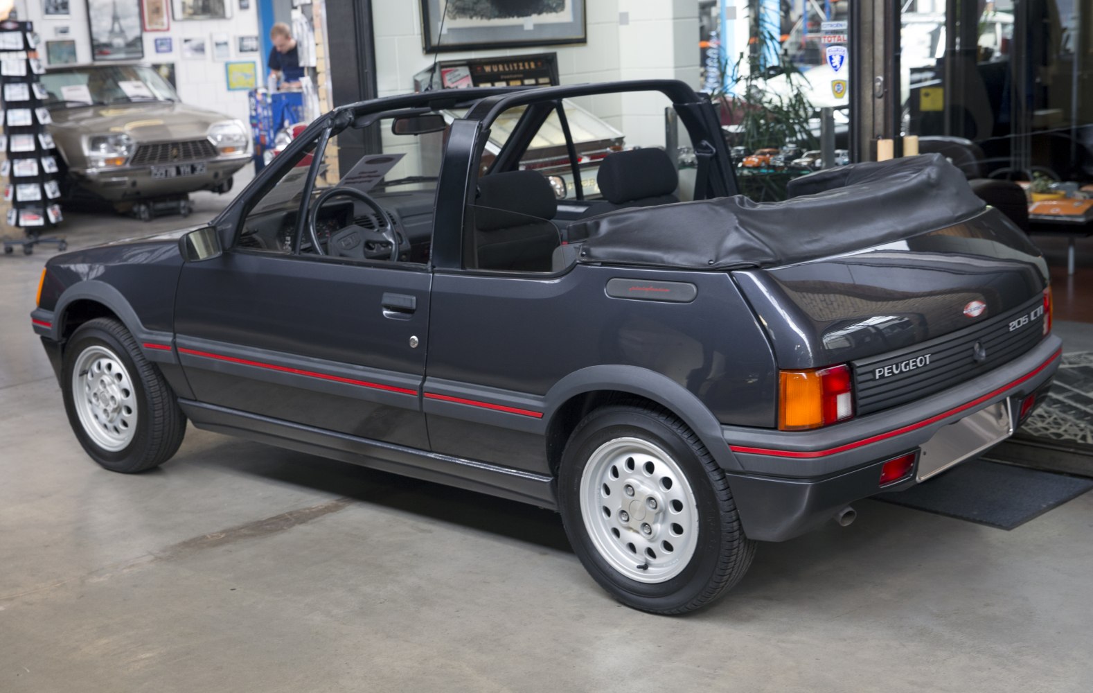 Classic convertible with folded soft top and vintage styling